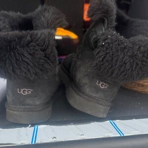 UGG women Black Furry Boots size 10 broken in.